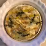 Camembert rôti piqué à l'ail et au thym : La photo est une représentation de l'étape 6