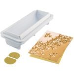 La photo représente l'ustensile : Moule pour bûche de noël