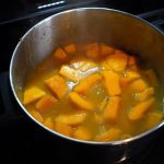 Creamy squash soup with curry and caramelized shallots in maple syrup: The image is a representative of the step 4