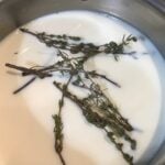 Thyme-flavoured béchamel sauce: The image is a representative of the step 1
