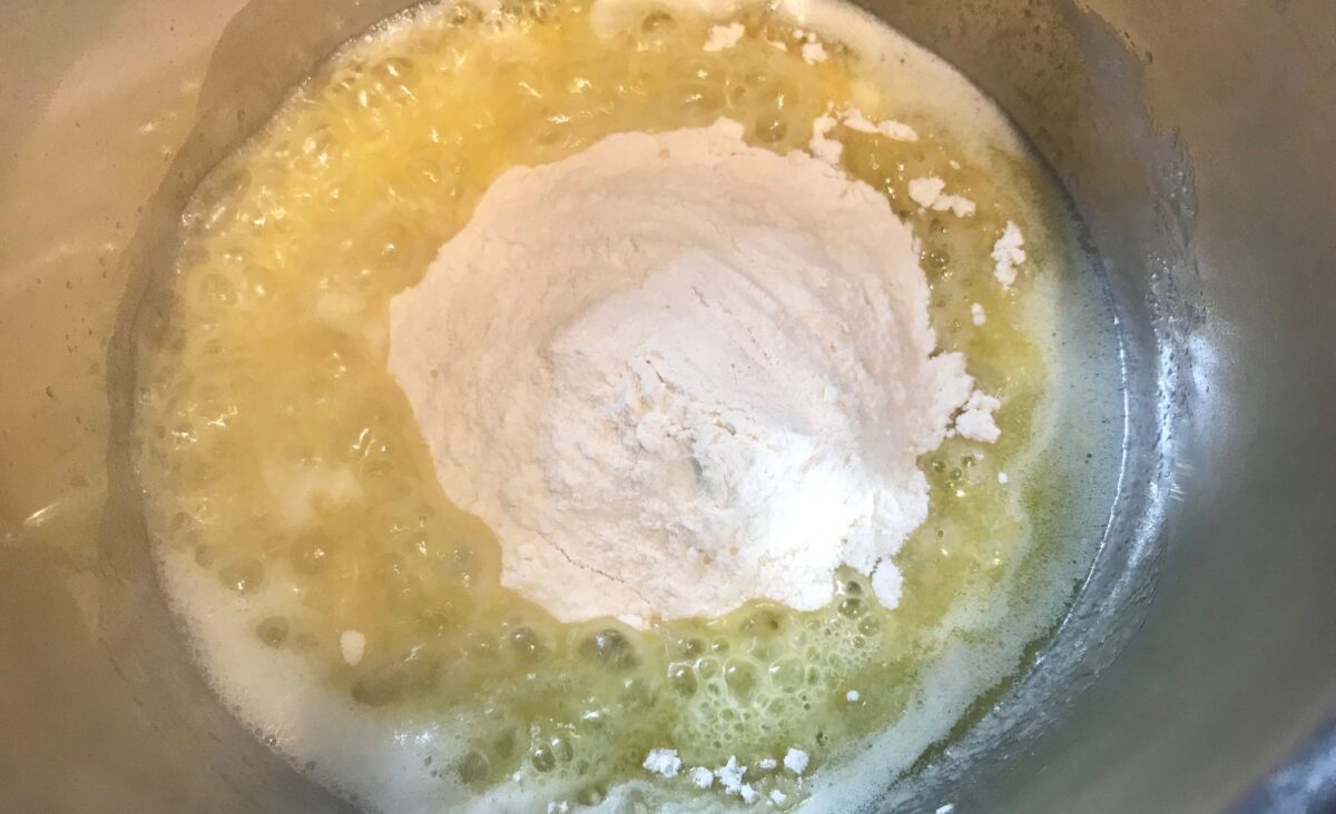 Thyme-flavoured béchamel sauce: The image is a representative of the step 3