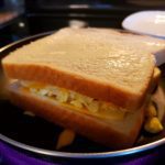 Grilled cheese with eggs and marbled cheddar: The image is a representative of the step 5
