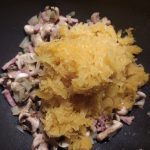 Spaghetti squash gratin with bacon lardons and mushrooms: The image is a representative of the step 6
