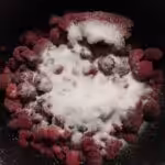 Panna Cotta d'Halloween à la vanille et coulis de framboise : La photo est une représentation de l'étape 4