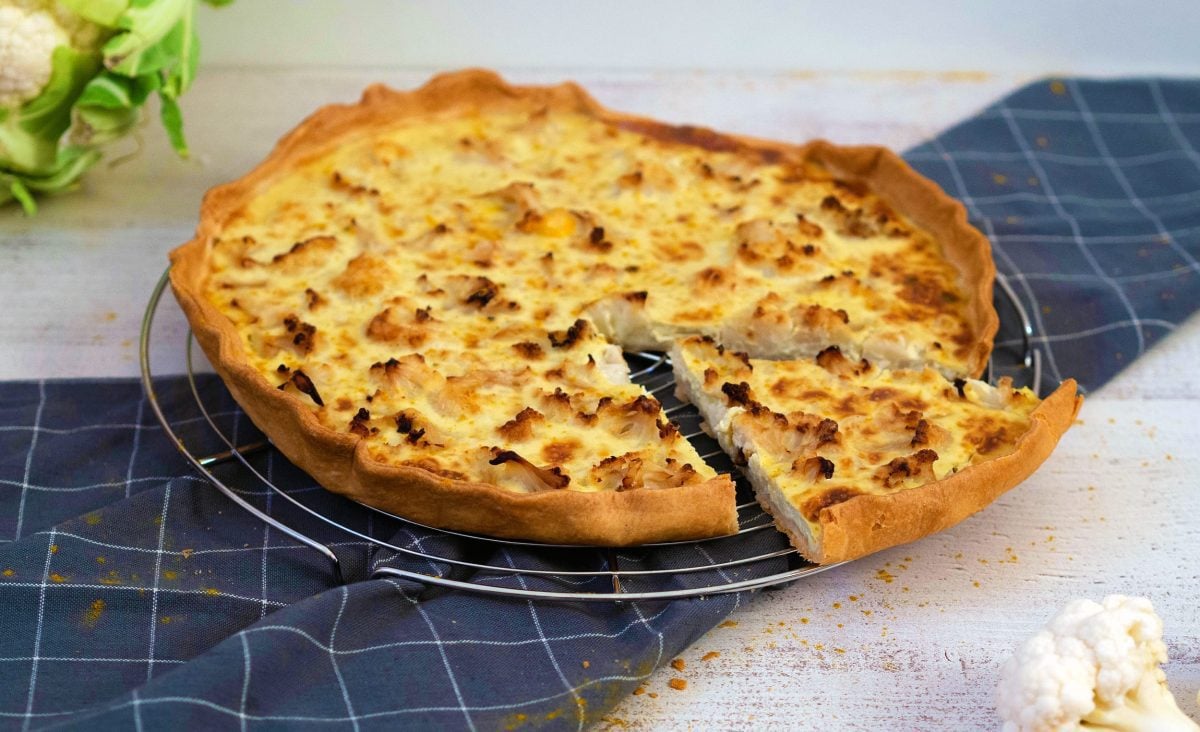 The photo represents the recipe: Cauliflower, Coconut, and Curry Tart: A Flavorful Fusion