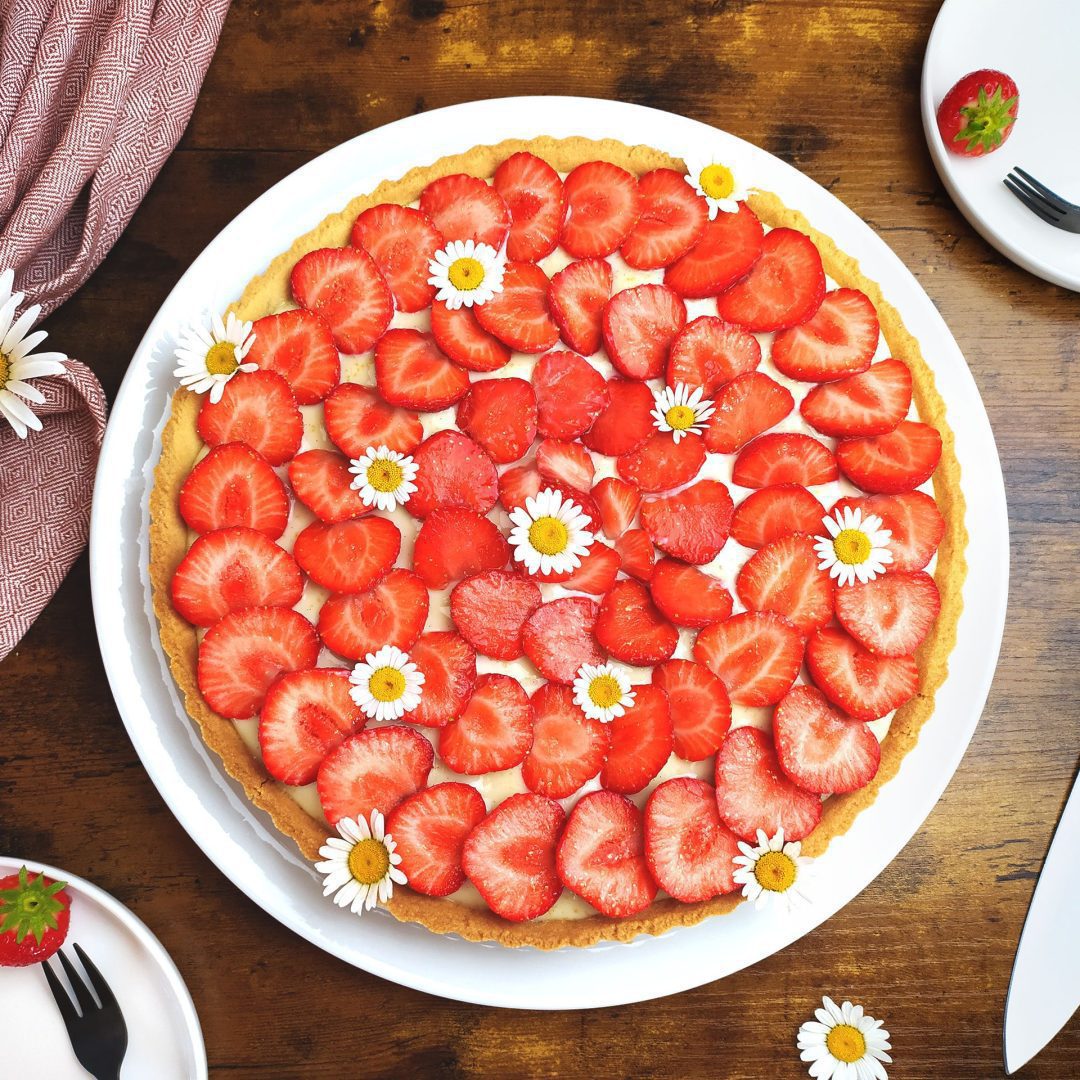 La photo représente la recette : Tarte aux fraises