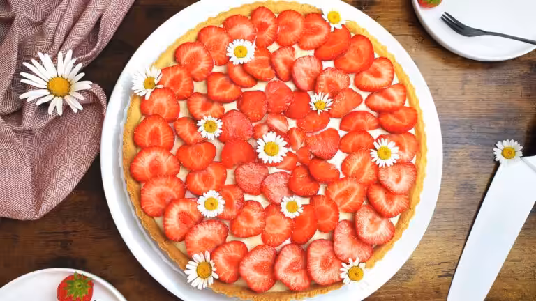 La photo représente la recette : Tarte aux fraises
