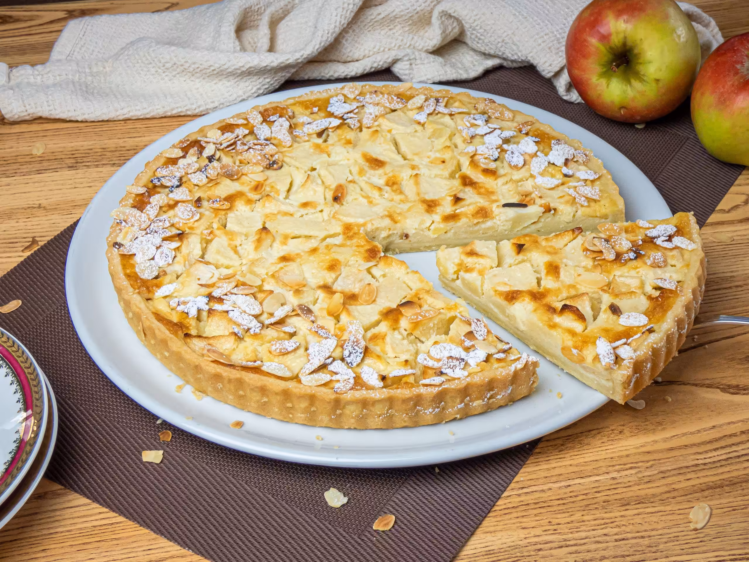 La photo représente la recette : Tarte Normande aux pommes