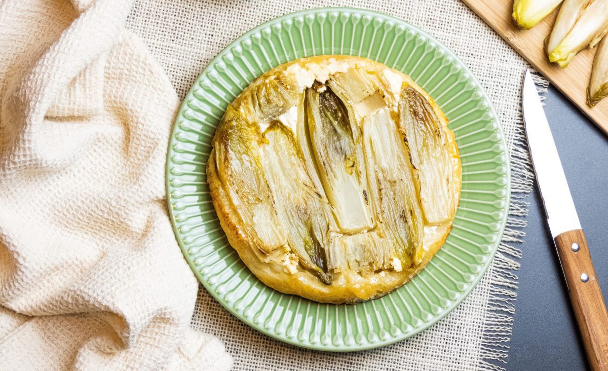 The photo represents the recipe: Endive and fresh goat cheese tatin