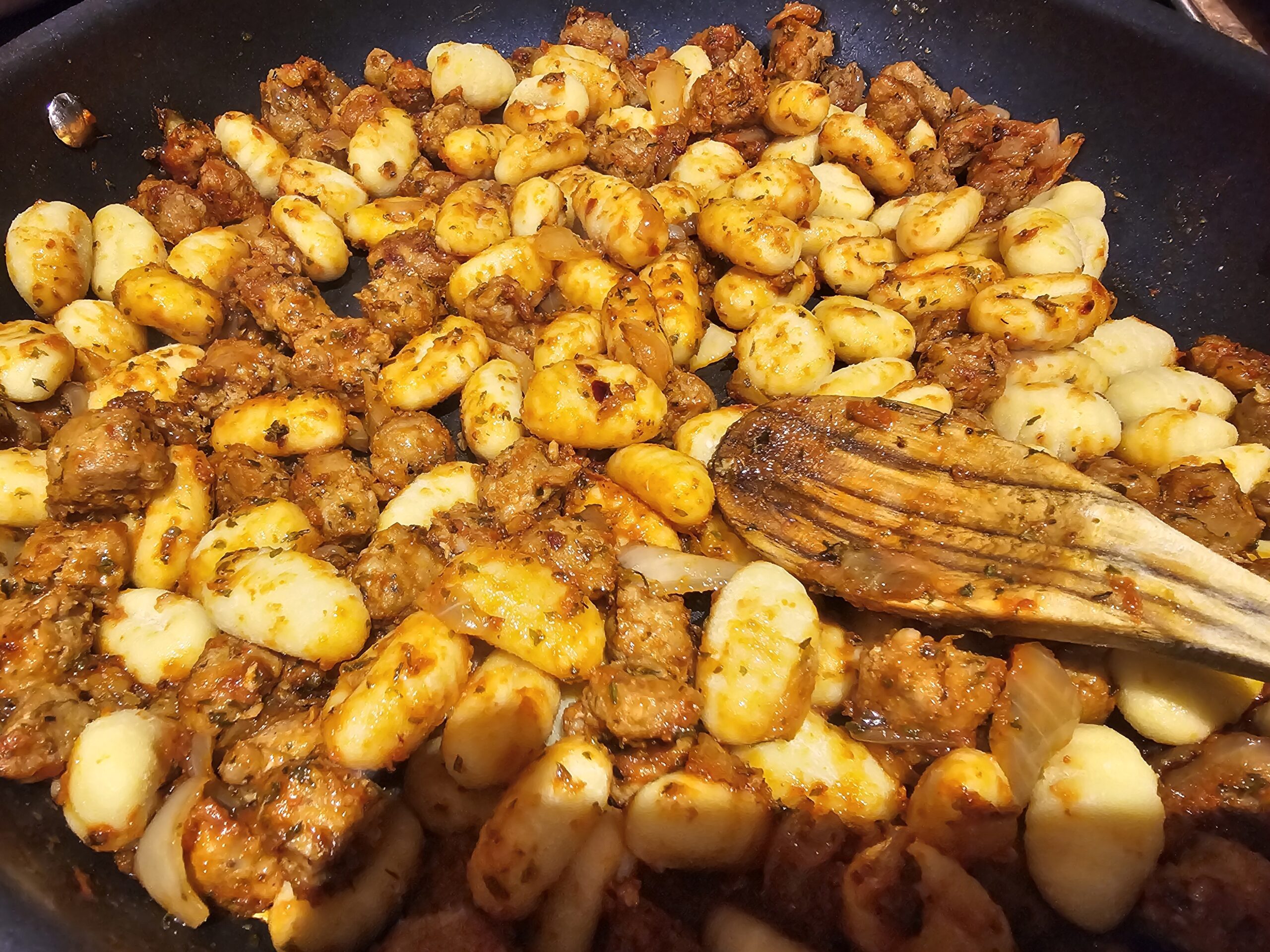 Gnocchi with Italian Sausage and Spicy Creamy Sauce : La photo est une représentation de l'étape 5