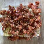 Roasted Feta with Chorizo and Oregano: The image is a representative of the step 3