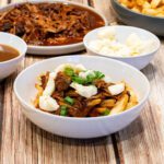 Pulled Pork Poutine : La photo est une représentation de l'étape 3