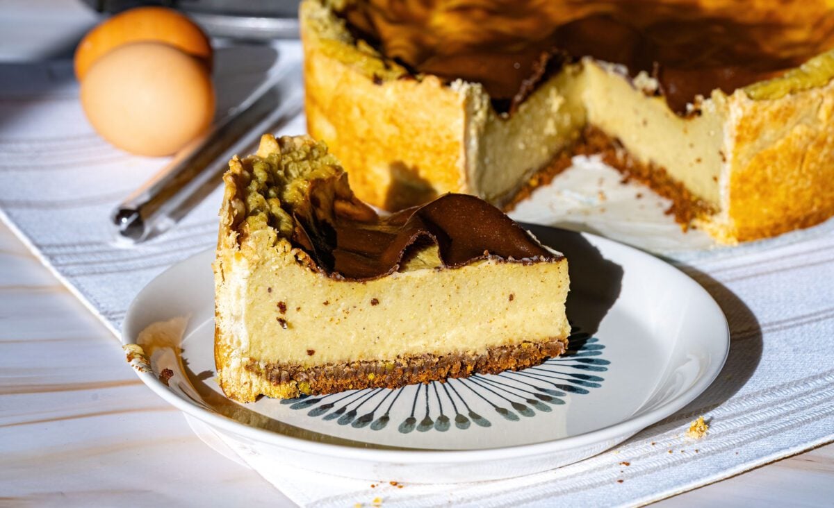 Pistachio Parisian flan (French custard pie) with speculoos and pistachio crust and shortcrust pastry