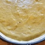 Flan pâtissier à la pistache avec croûte spéculoos-pistache et pâte brisée : La photo est une représentation de l'étape 10