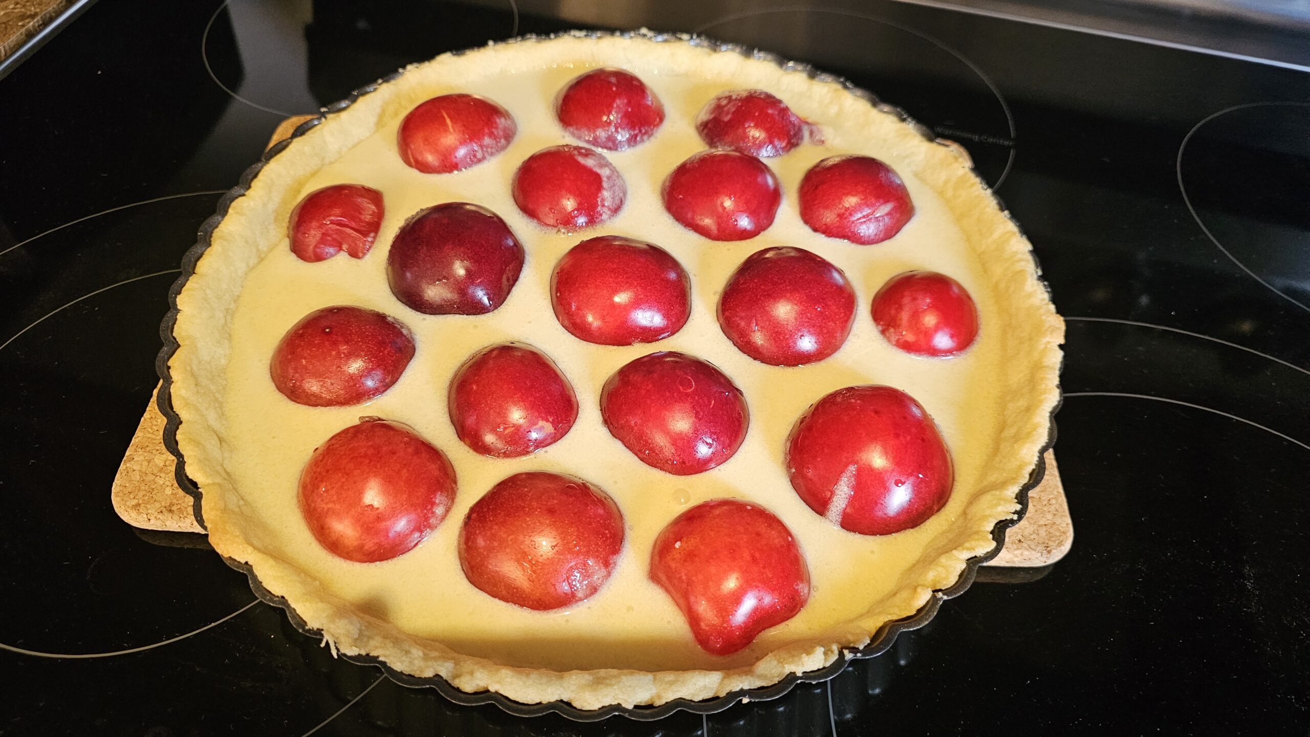 Plum tart with almond shortcrust pastry : La photo est une représentation de l'étape 4