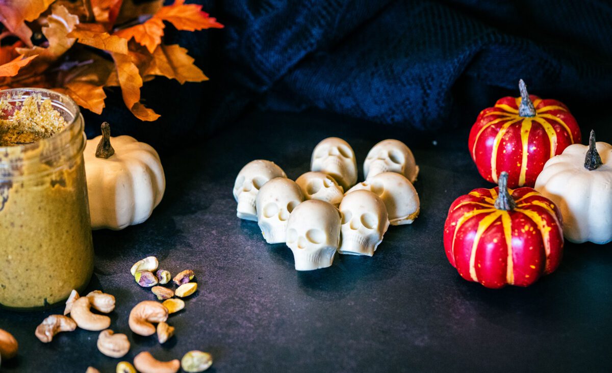 Halloween skeleton candies with white chocolate, cashews, and pistachio cream