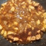 Asian wok with sweet and savory chicken, soy sauce, hoisin, rice, and stir-fried vegetables : La photo est une représentation de l'étape 3