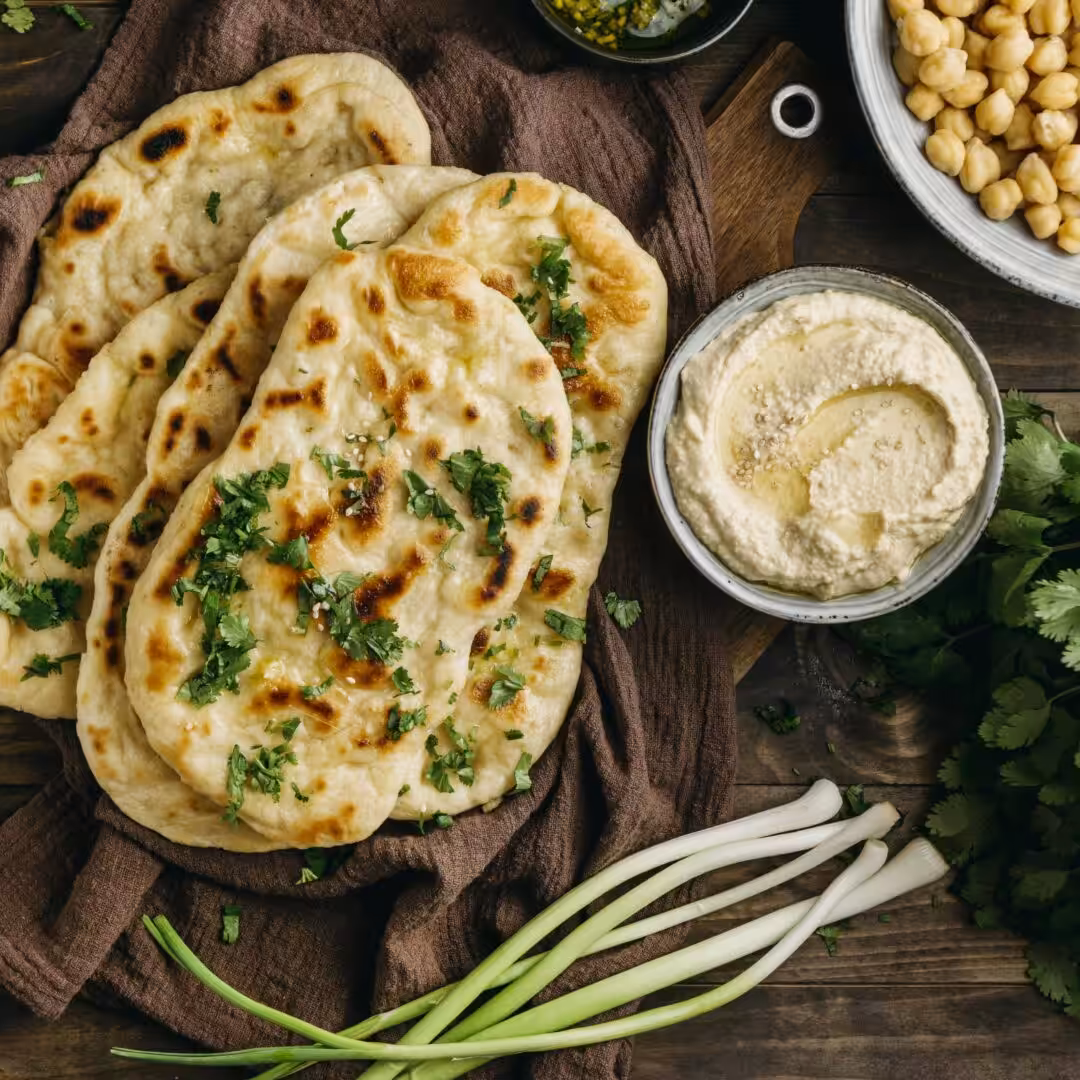 The photo shows the ingredient: Naan Bread