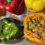 Poivrons farcis au quinoa, chipolatas et patate douce - Recette gourmande : La photo est une représentation de l'étape 6