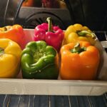 Poivrons farcis au quinoa, chipolatas et patate douce - Recette gourmande : La photo est une représentation de l'étape 7